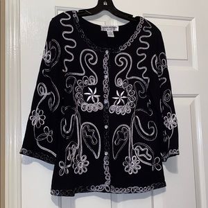 Black jacket that matches the blouse and is cute!